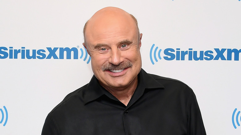 Dr Phil souriant