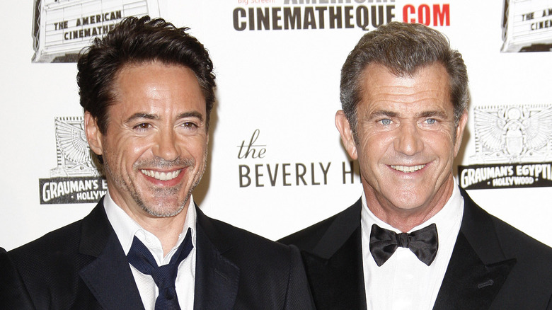 Robert Downey Jr. et Mel Gibson souriant