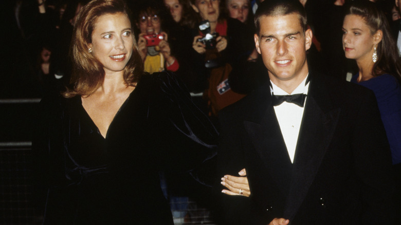 Tom Cruise et Mimi Rogers souriants