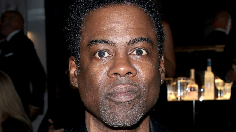 Chris Rock pose pour les caméras