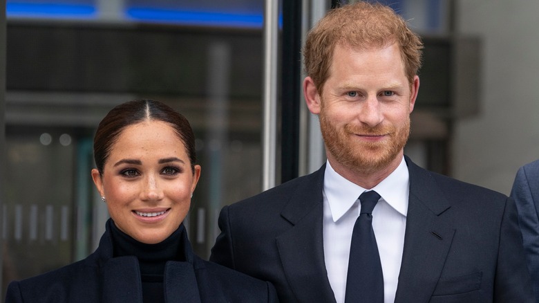 Meghan Markle et le prince Harry sourient