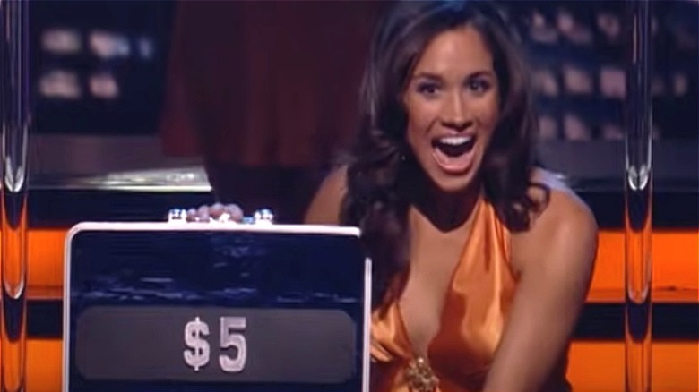 Meghan Markle sur Deal or No Deal, en riant