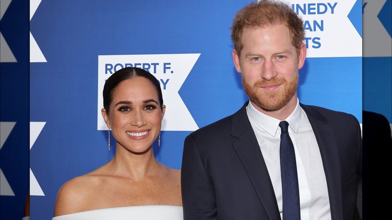 Meghan Markle et le prince Harry sourient