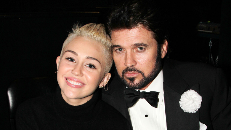 Miley et Billy Ray Cyrus posent