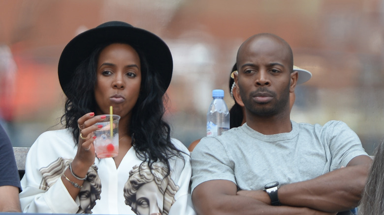 Kelly Rowland et Tim Weatherspoon assis