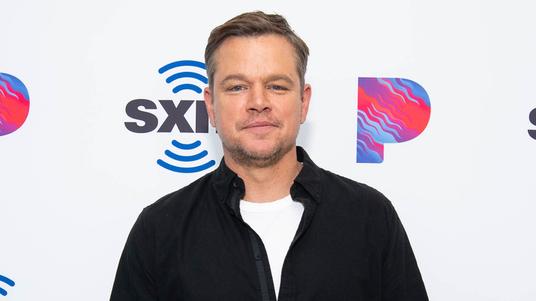 Matt Damon posant pour des photos