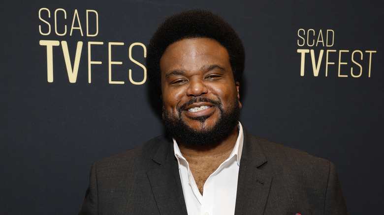 Craig Robinson souriant