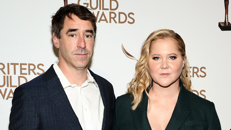 Amy Schumer et Chris Fischer posent