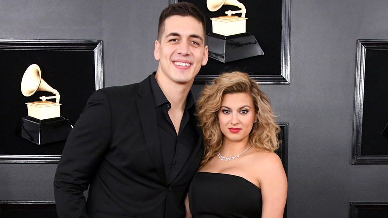 Andre Murillo and Tori Kelly posing