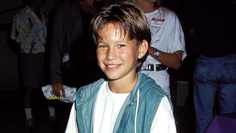 Jonathan Taylor Thomas souriant