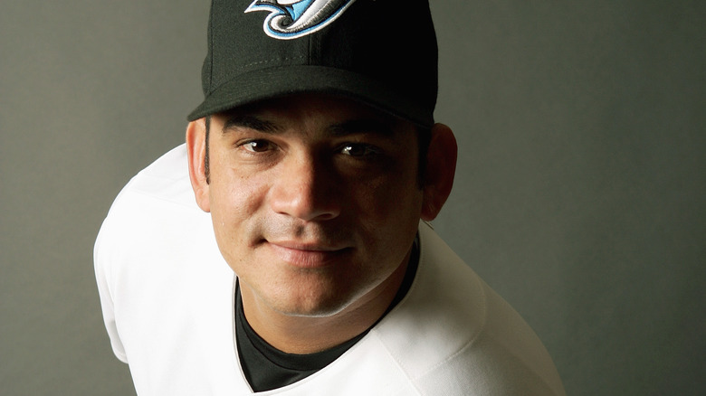 Geremi Gonzalez souriant avec une casquette de baseball