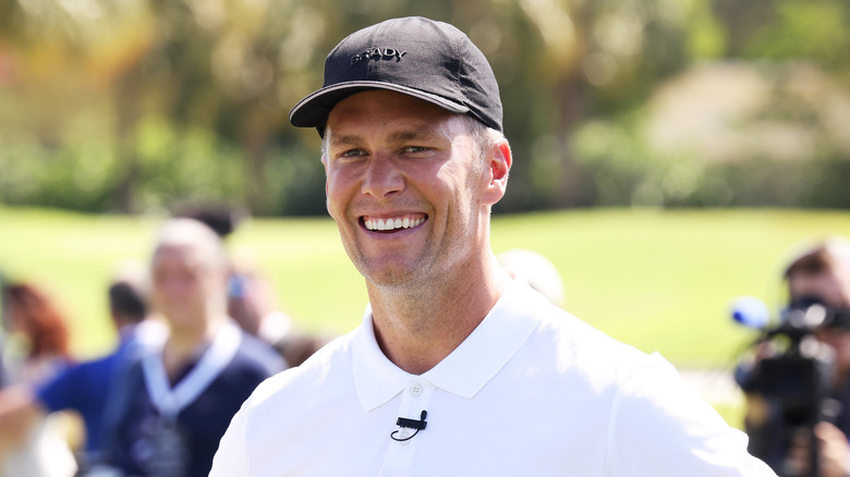 Tom Brady souriant sur le terrain de golf de Miami