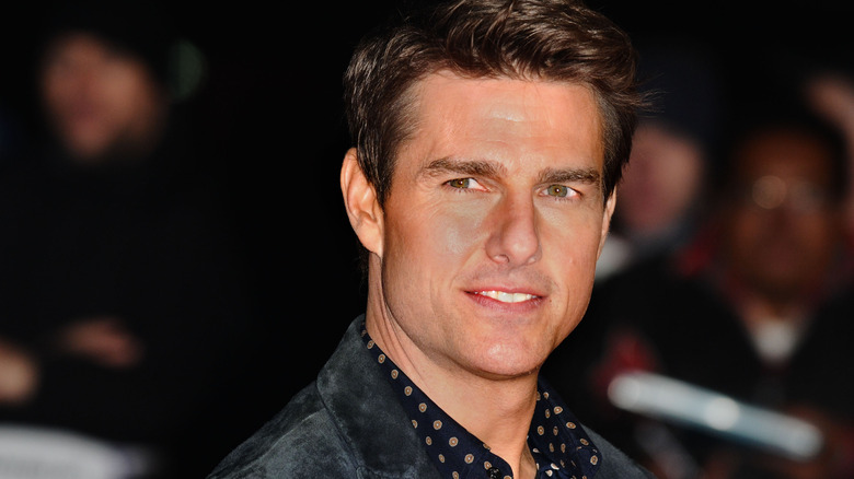 Tom Cruise souriant à l'avant-première du film