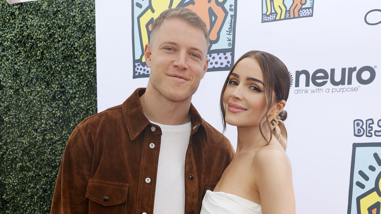 Olivia Culpo Christian McCaffrey souriant