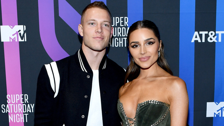 Olivia Culpo Christian McCaffrey souriant