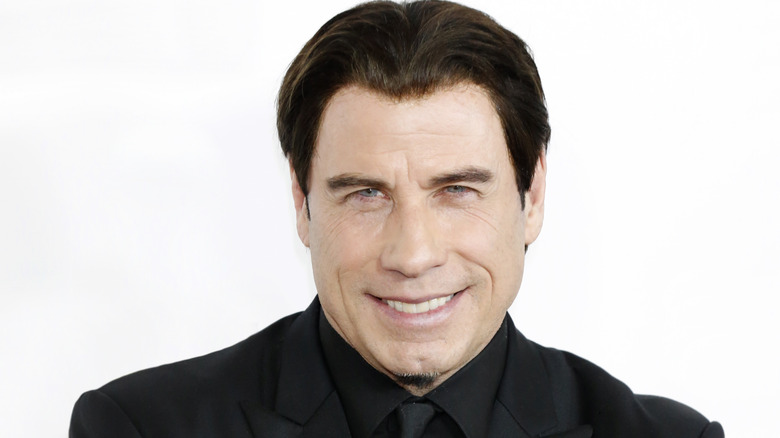 John Travolta posant en 2014