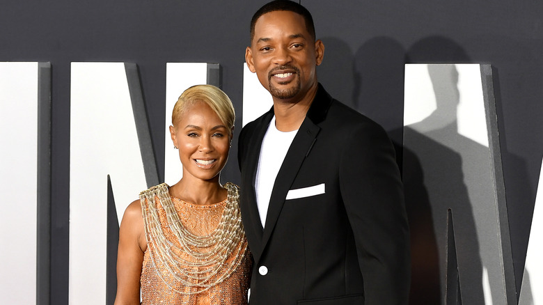 Jada Pinkett Smith et Will Smith posant