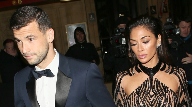 Grigor Dimitrov et Nicole Scherzinger quittant un événement