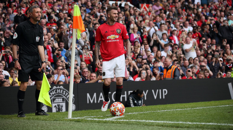 David Beckham jouant au football