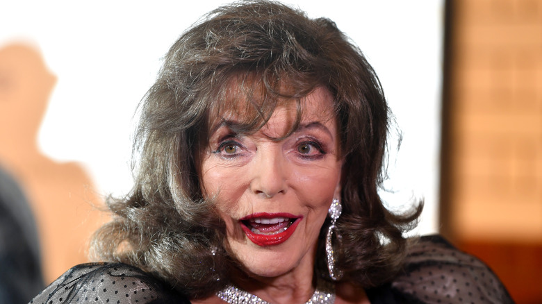 La rencontre de Joan Collins avec la famille royale ne s’est pas déroulée exactement comme prévu