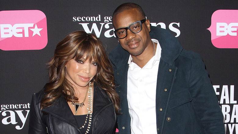 Tisha Campbell et Duane Martin posant