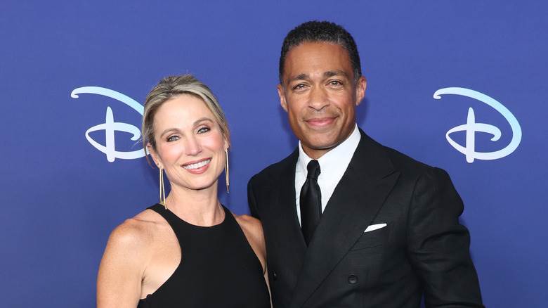 Amy Robach et TJ Holmes souriants