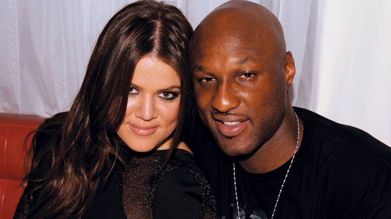 Khloé Kardashian et Lamar Odom posant