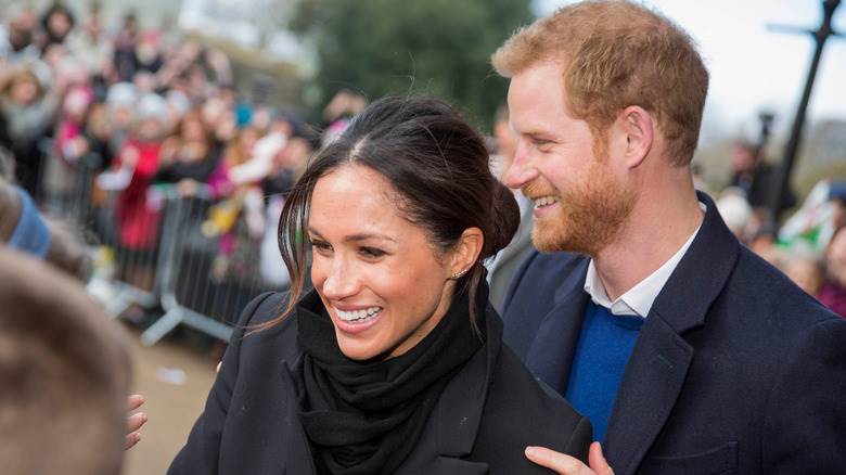 Meghan Markle et le prince Harry souriants