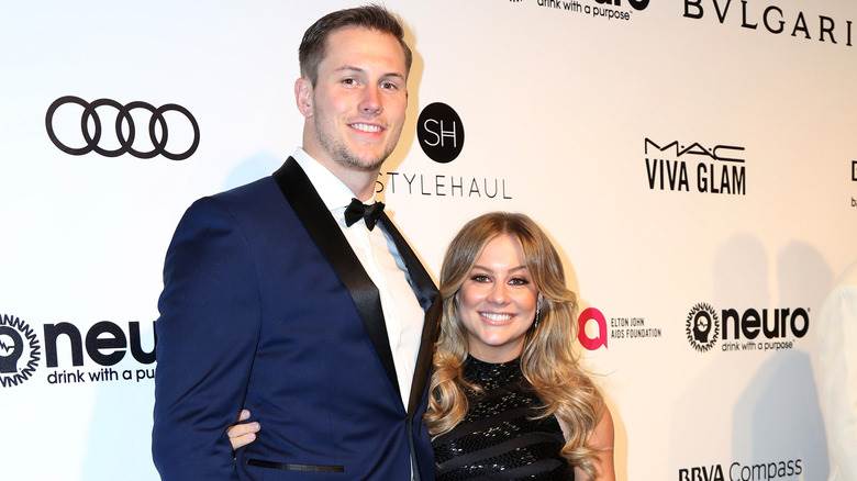 Shawn Johnson et Andrew East souriants