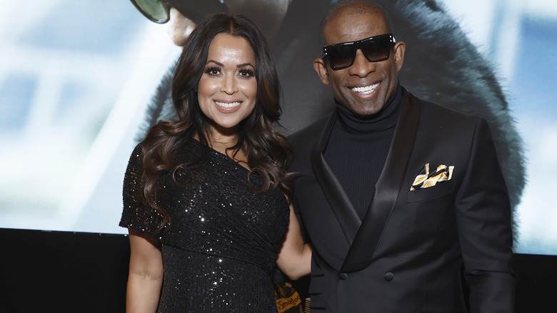 Tracey Edmonds et Deion Sanders souriants