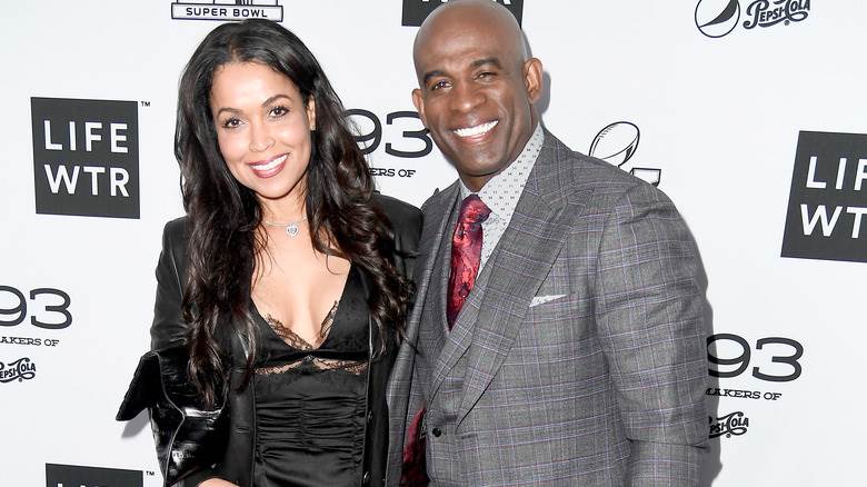 Tracey Edmonds et Deion Sanders souriants