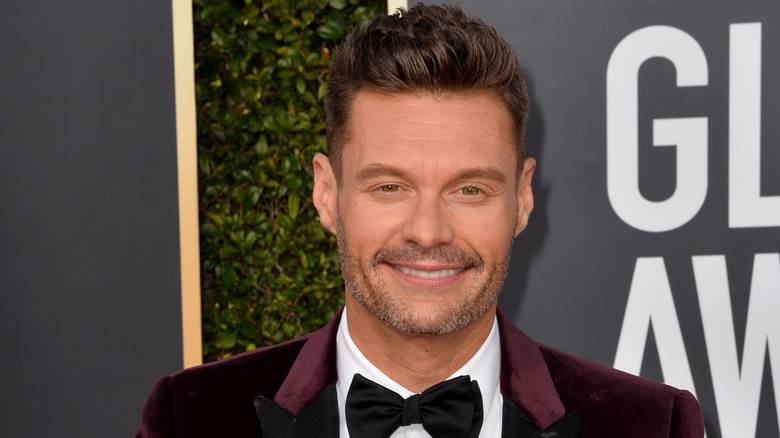 Ryan Seacrest smoking violet