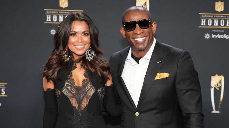 Deion Sanders et Tracey Edmonds posant