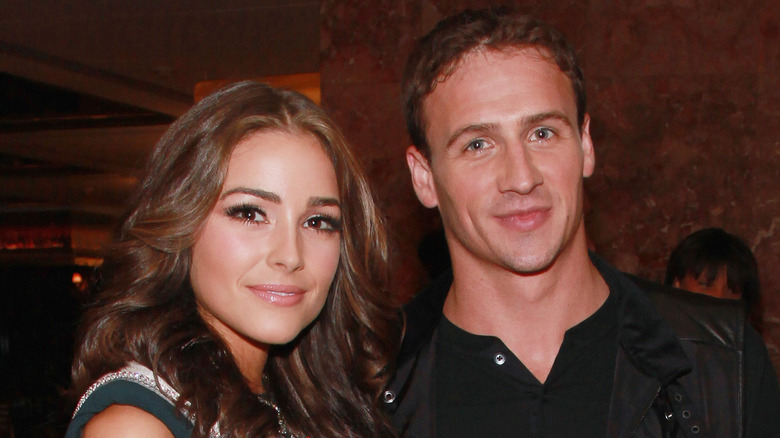 Ryan Lochte et Olivia Culpo souriants