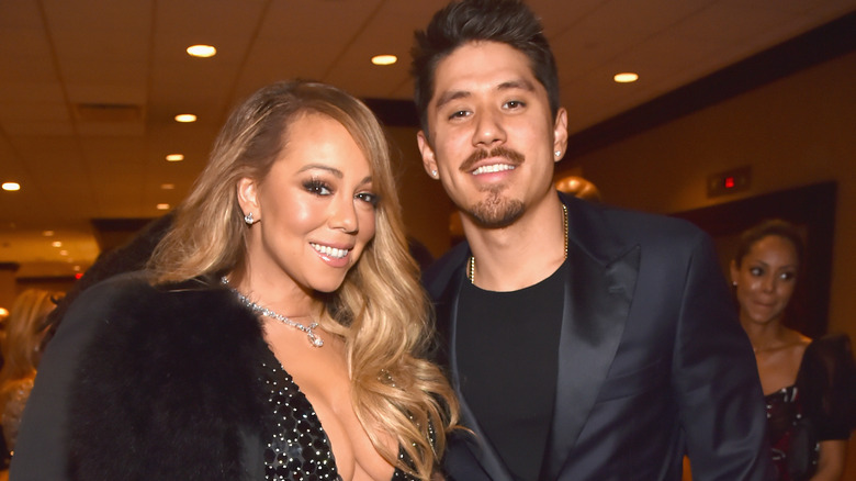 Mariah Carey et Bryan Tanaka souriants en gros plan