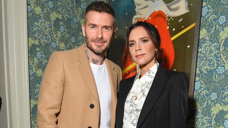 David Beckham Victoria Beckham souriante