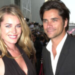 Rebecca Romijn et John Stamos souriants