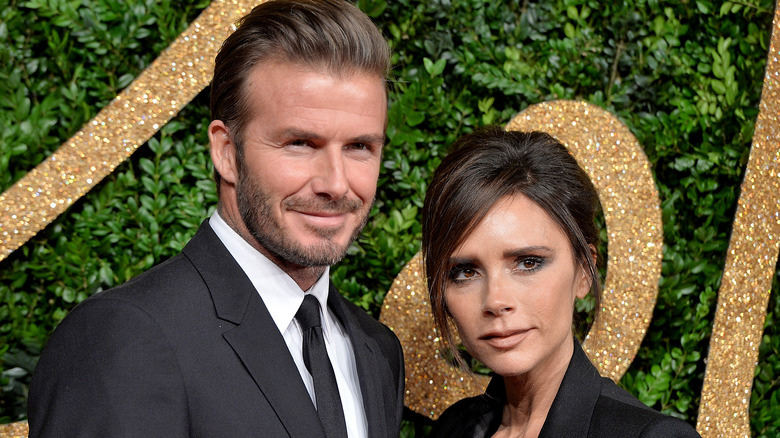 David Beckham et Victoria Beckham posant