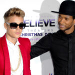 Usher regarde Justin Bieber