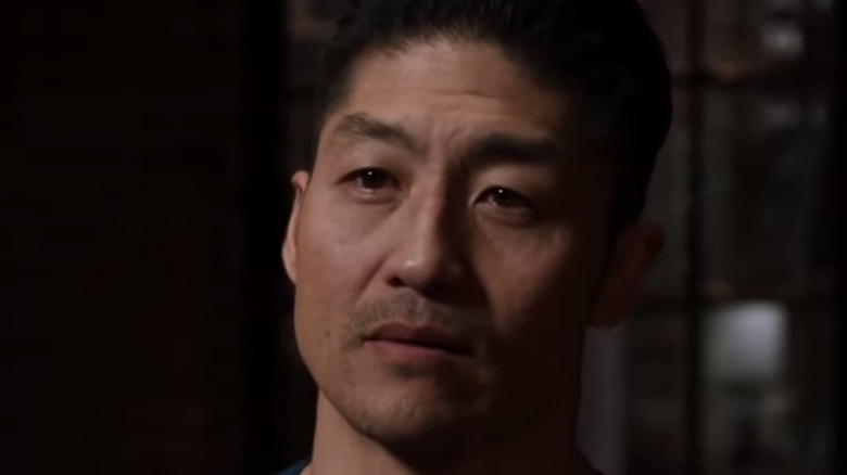 Brian Tee visage sérieux