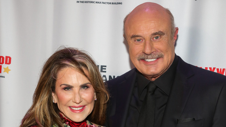 Robin McGraw et le Dr Phil McGraw sur le tapis rouge