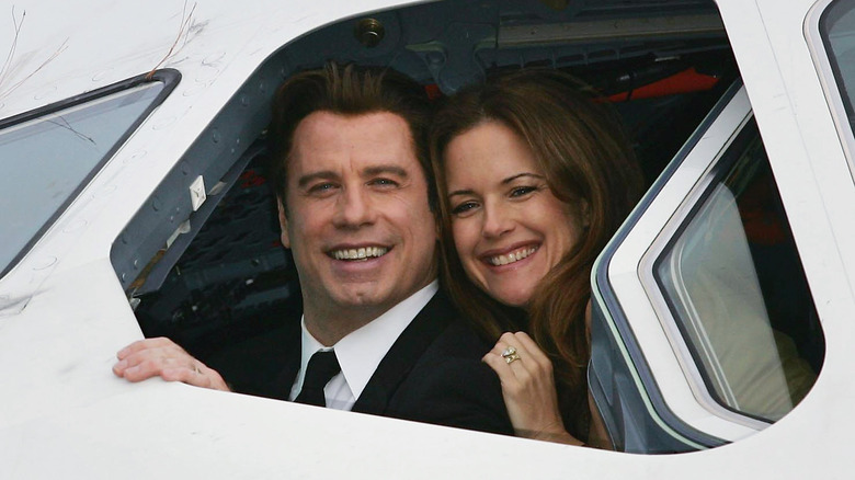 John Travolta et sa femme Kelly Preston dans un avion