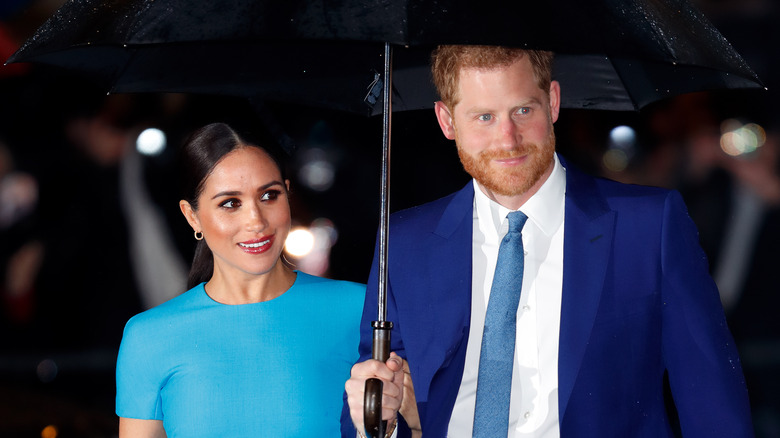 Meghan Markle et le prince Harry souriants