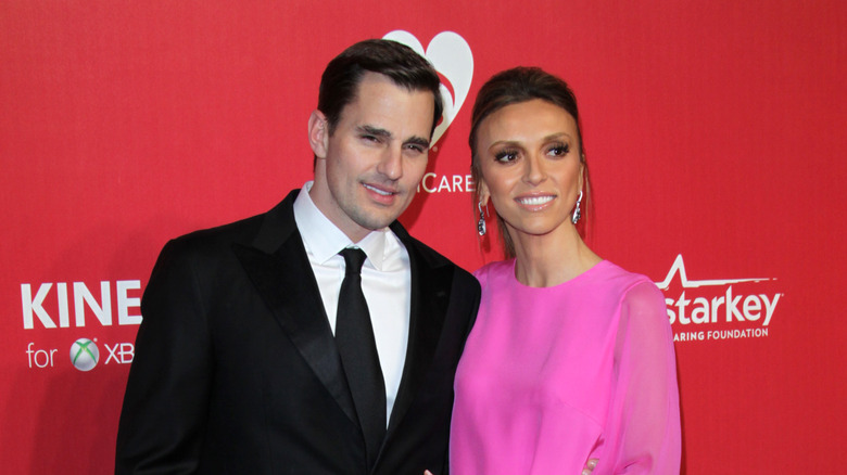 Bill et Giuliana Rancic posant