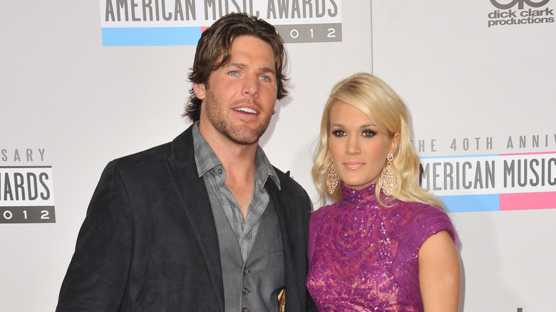 Carrie Underwood et Mike Fisher posent ensemble sur le tapis rouge