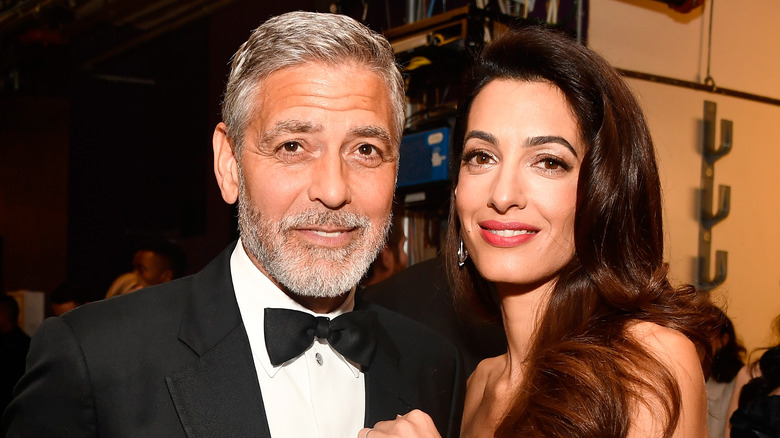 George et Amal Clooney souriants