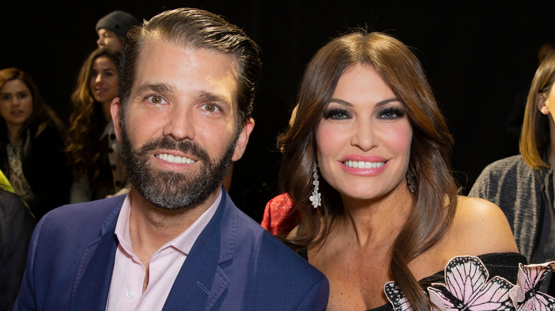 Donald Trump Jr., Kimberly Guilfoyle souriant