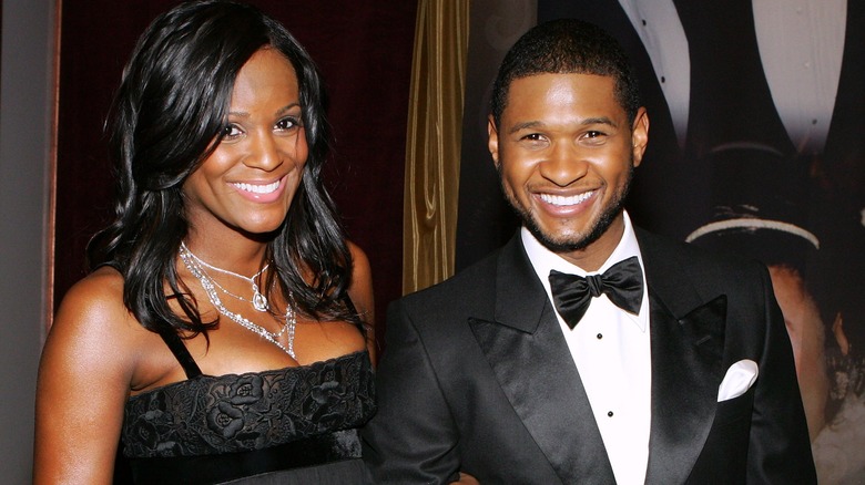 Usher et Tameka Foster souriant