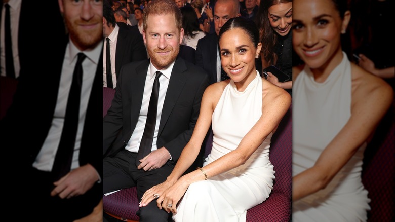 Le prince Harry et Meghan Markle souriants