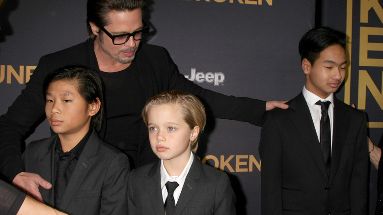 Brad Pitt avec Pax, Shiloh et Maddox